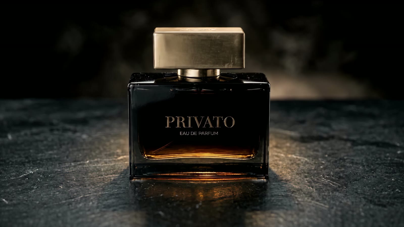 PRIVATO Eau de Parfum bottle on dark stone, from the commercial